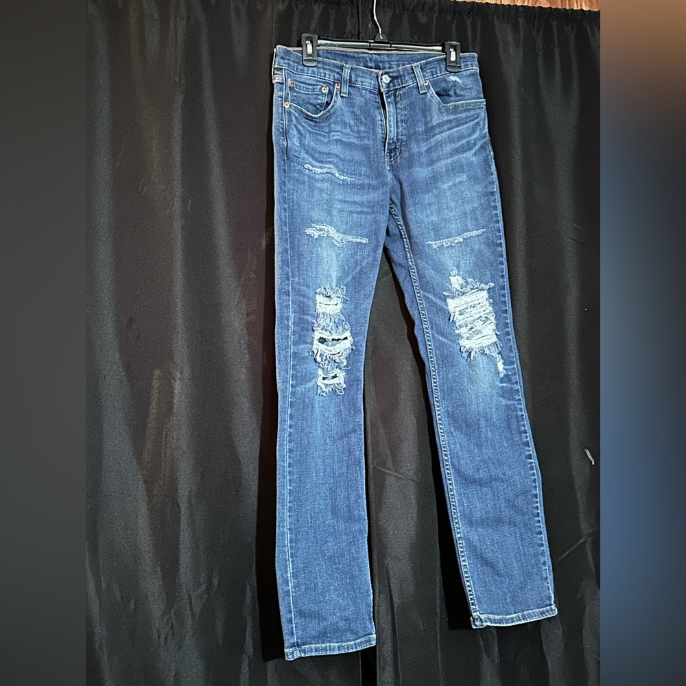Men’s Levi 511 red tag pants in size 32x34.